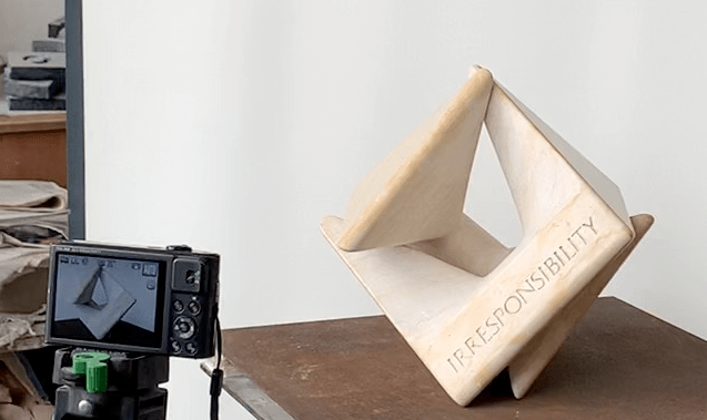 “BEYAHAD LO NI-PAUL“; series: “A Traveling Tombstone”; Sculptor: Robert Schmidt-Matt. Material: Jerusalem Limestone, 23 x 23 x 23 cm. Engraved: “RESPONSIBLE IRRESPONSIBILITY  Paul A. Levine”. 